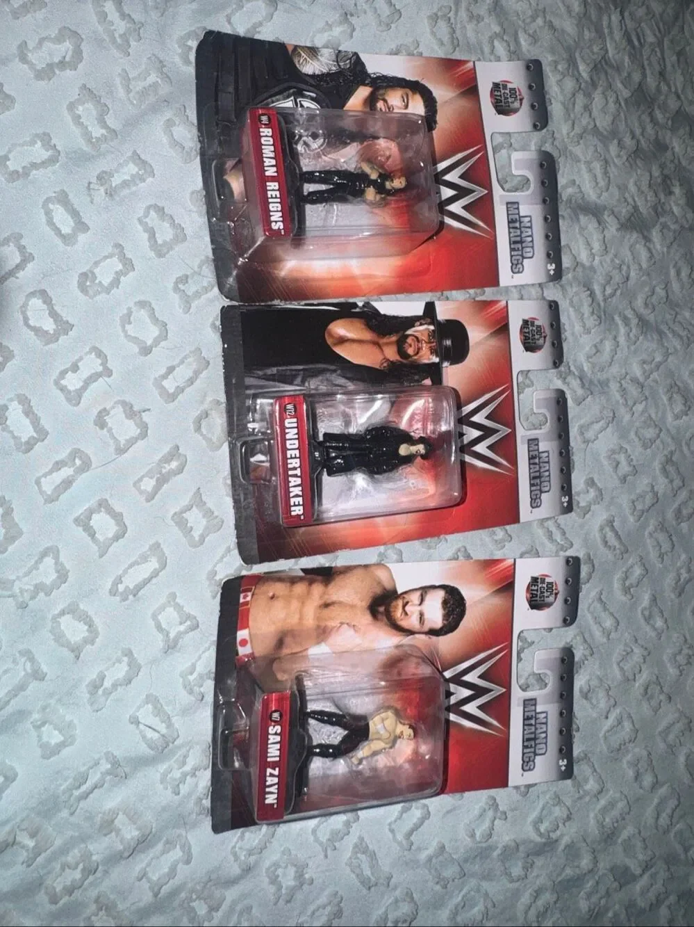 NWT Wrestling mini characters. Roman reigns and undertaker